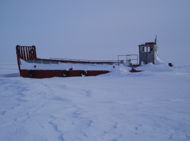 frieghter ship stuck in the ice and snow